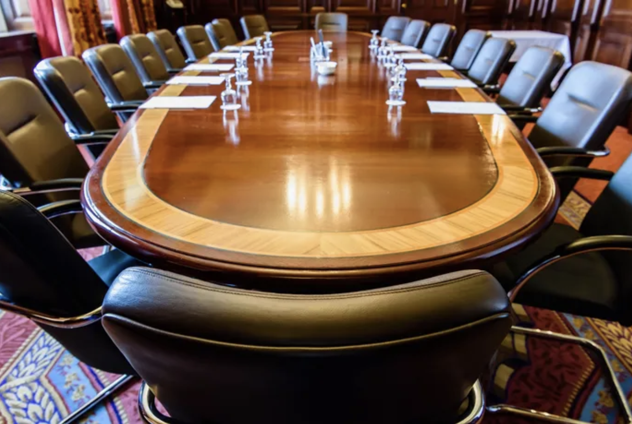 Cybersecurity talks at the boardroom table.
