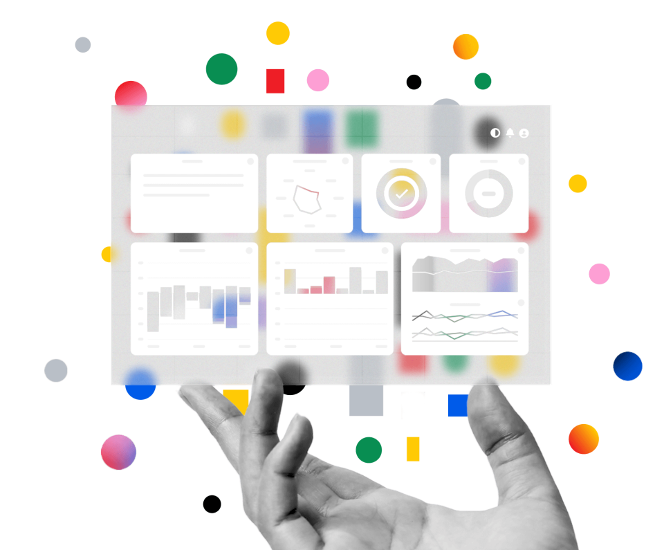 Panzura Symphony dashboard in a hand holding pane of glass with small shapes behind.